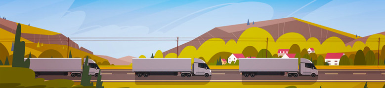 Trucks, landscape in background.