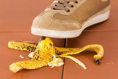 Person about to step on banana peel - learn how to avoid the top 10 moving mistakes.