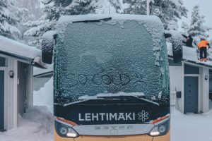 Bus covered in snow
