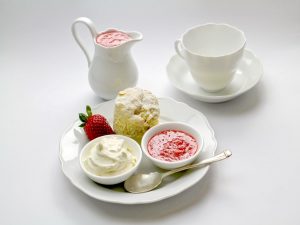 A white dessert set with cakes and spreads, as an example of items movers won't move.