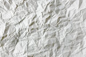 A crumpled wet paper you shouldn't bring when you want to recycle packing materials in Portland, Oregon