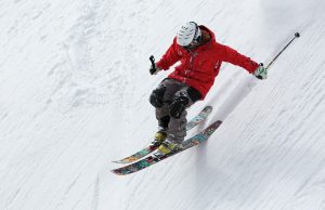 A man skiing down a slope.