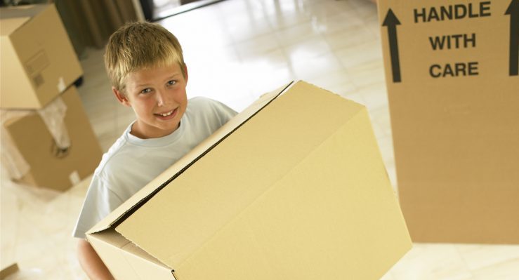 Children with moving boxes