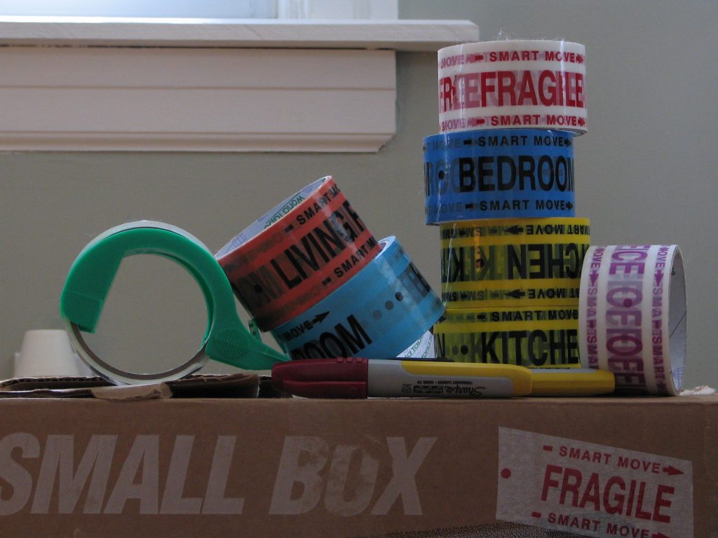 Packing tape and a box