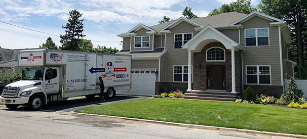 great movers company truck in front of a house they are moving