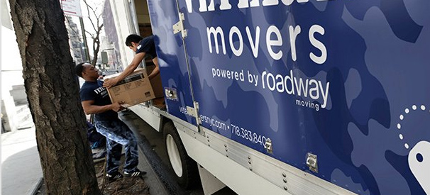 veteran movers crew loading the comapny's moving truck