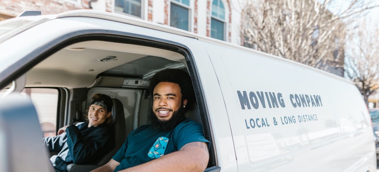 Two guys in a moving truck