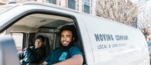 Two guys in moving company van