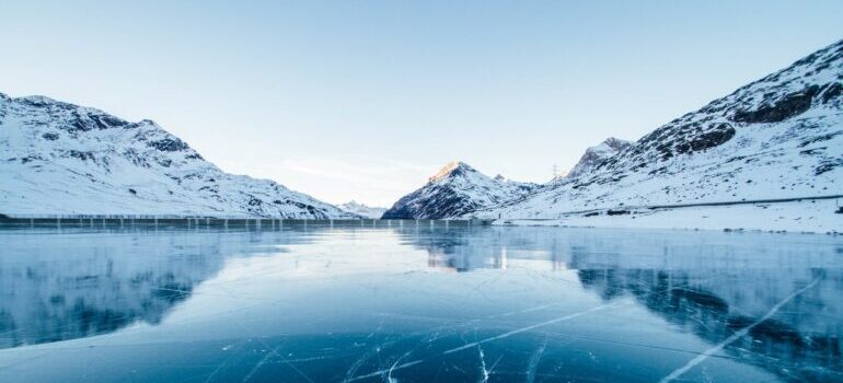 A landscape of a snowy frozen lake.