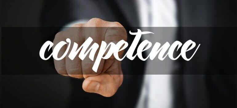 A man pointing to competence.