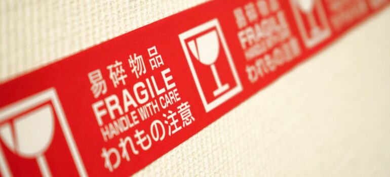 a red label tape that says "fragile" on it