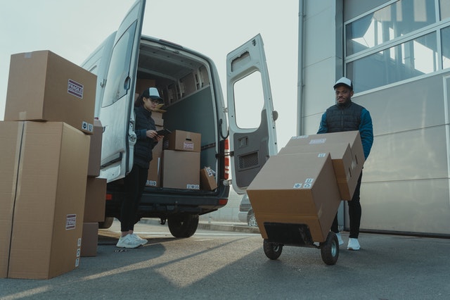 movers unloading a van